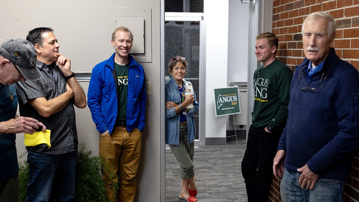 Sen. Angus King, his son Angus King III, and others