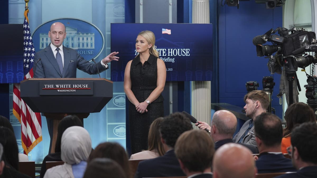 White House Deputy Chief of Staff Stephen Miller, with White House press secretary Karoline Leavitt, speaks during a press briefing at the White House on Thursday, May 1, 2025 in Washington, D.C.