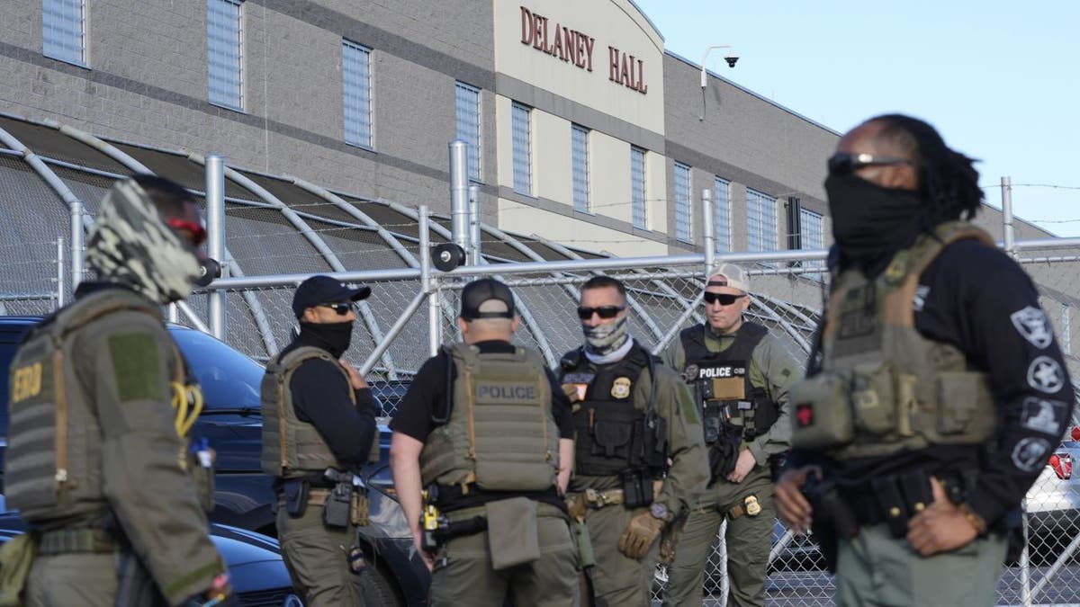 Security unit guidelines successful beforehand of Delaney Hall, a precocious re-opened migration detention center, successful Newark, N.J., Wednesday, May 7, 2025. (AP Photo/Seth Wenig)