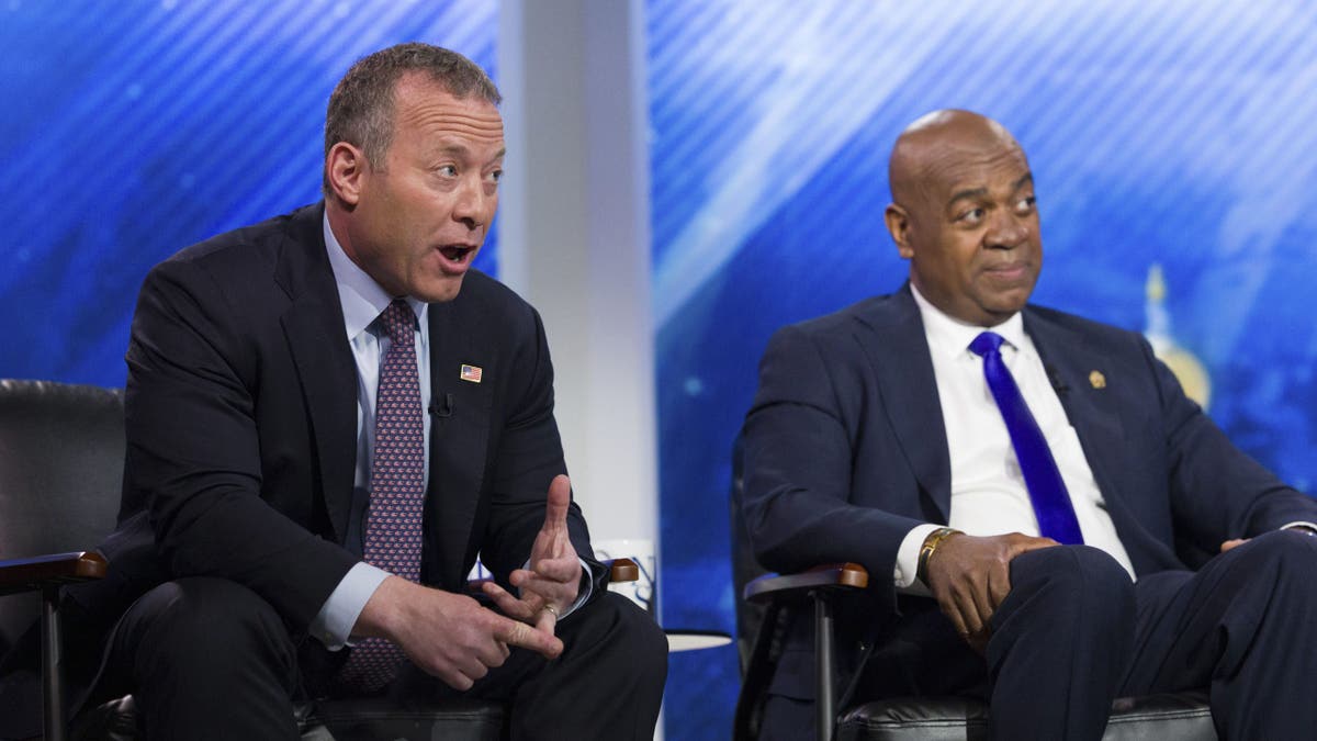 Ras Baraka, right, with Rep. Josh Gottheimer at debate