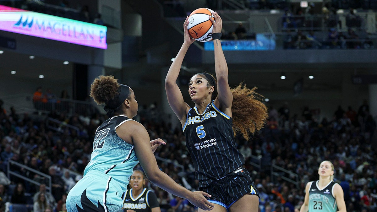 Angel Reese layup