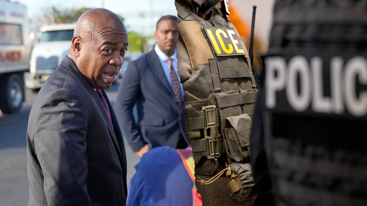Ras Baraka, left; ICE agents, right in photo split