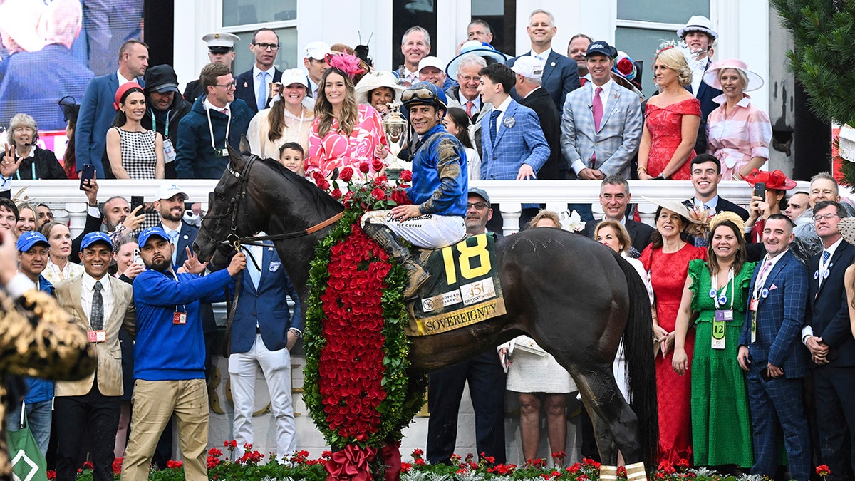Sovereignty, ridden by jockey Junior Alvarado, celebrating win