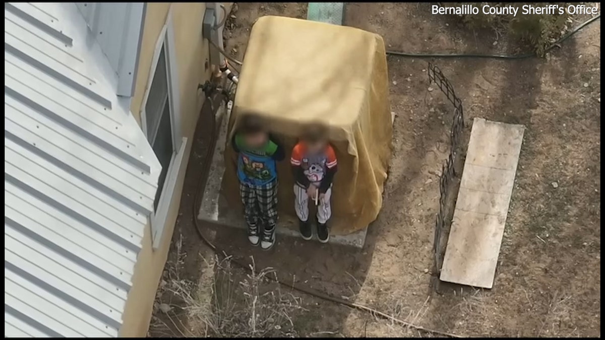 Boys holding handgun during New Mexico standoff