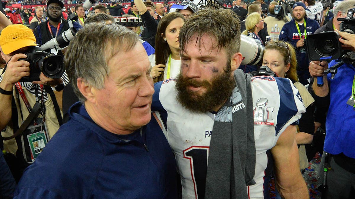 Bill Belichick celebrates with wide receiver Julian Edelman
