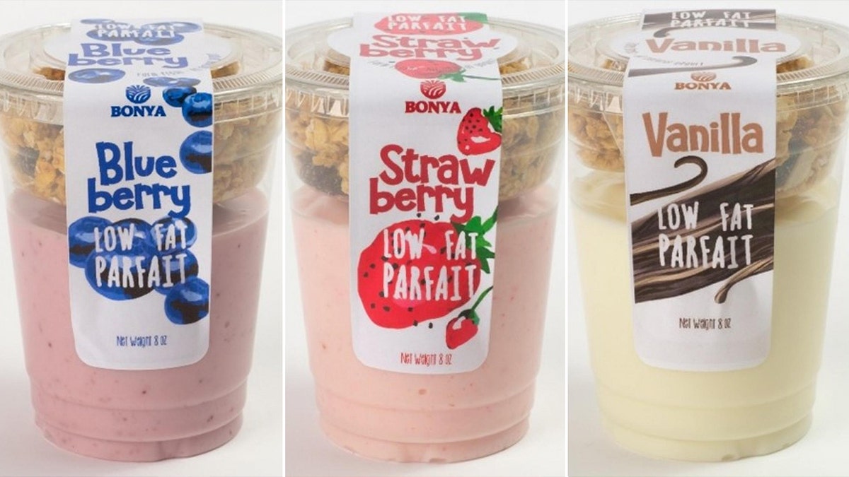 A three-way split of Bonya low-fat yogurt parfait flavors, from left to right, blueberry, strawberry and vanilla.