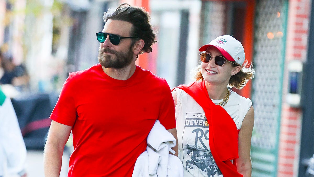 Bradley Cooper and Gigi Hadid walking together