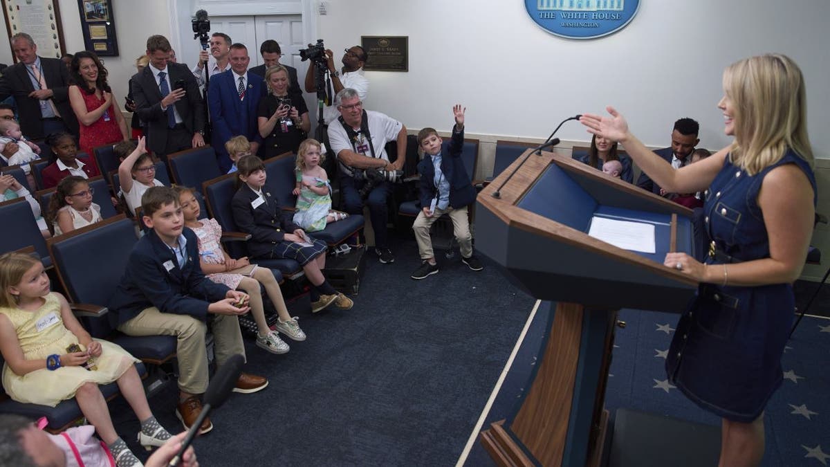 White House press secretary Karoline Leavitt speaks with children during a briefing for children during a Take Our Daughters and Sons to Work Day in the James Brady Press Briefing Room at the White House, Tuesday, May 20, 2025, in Washington. (AP Photo/Evan Vucci