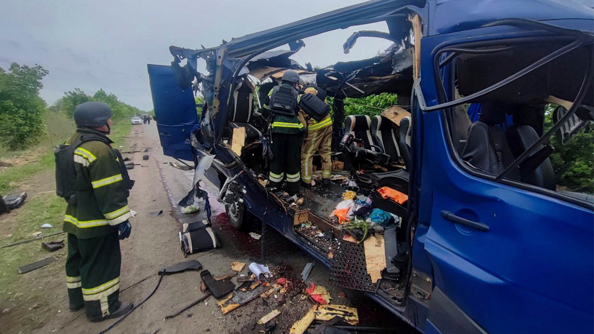 Rescuers recover the bodies of passengers