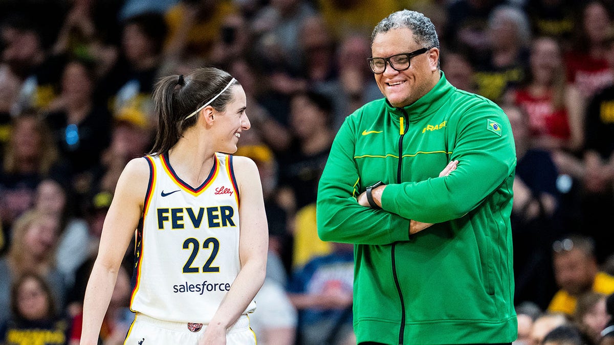 Caitlin Clark speaks with Team Brazil coach