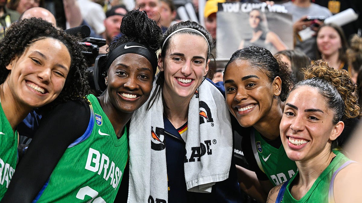 Caitlin Clark smiles with Team Brazil