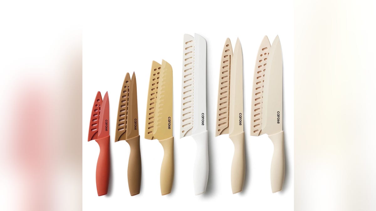 The CAROTE 12-Pc Kitchen Knife Set has stainless steel blades that cut through most things.