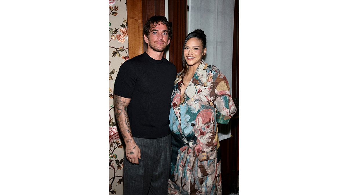 Cassie Ventura shows off her baby bump with husband Alex Fine
