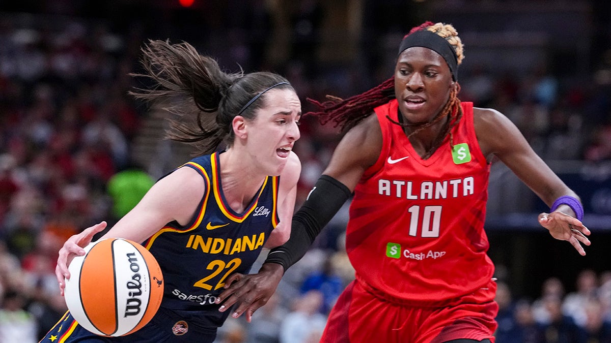 Caitlin Clark dribbling