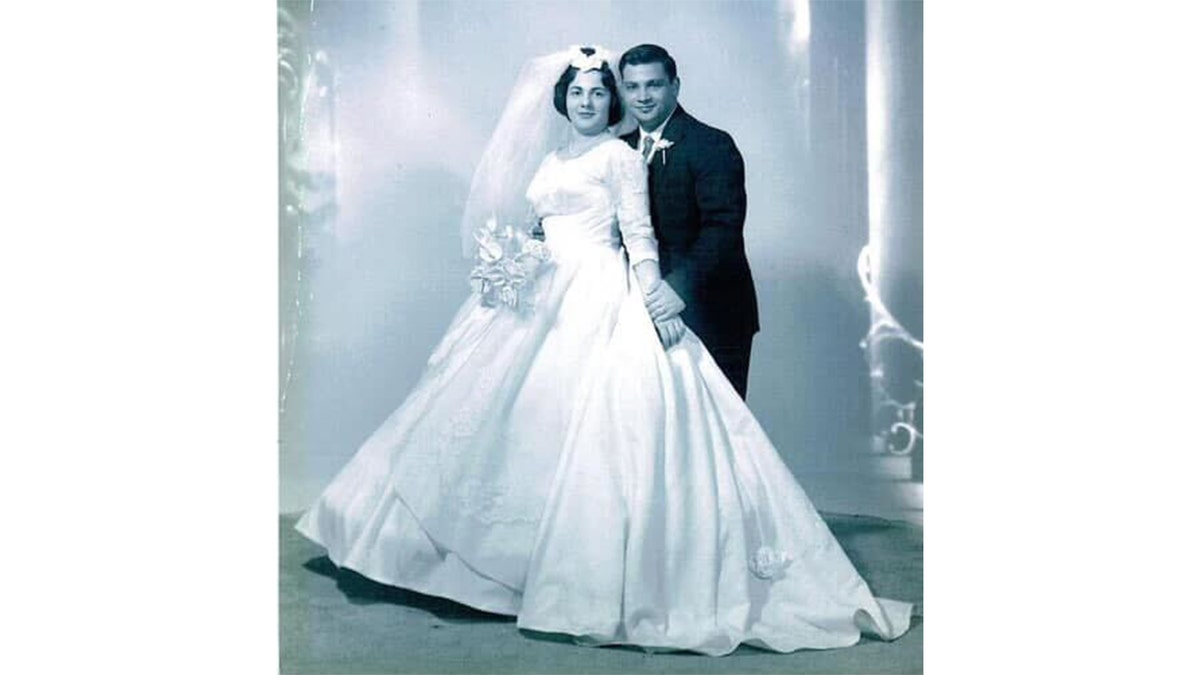 Charley Scalies and his wife on their wedding day