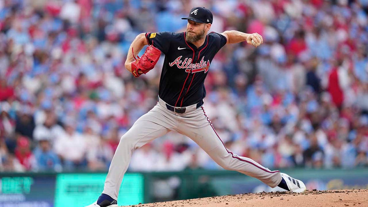 Chris Sale pitches