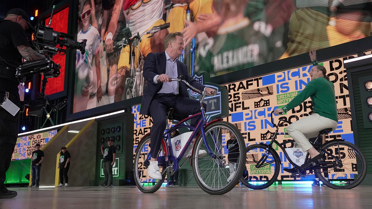 Roger Goodell and Clay Matthews ride bike