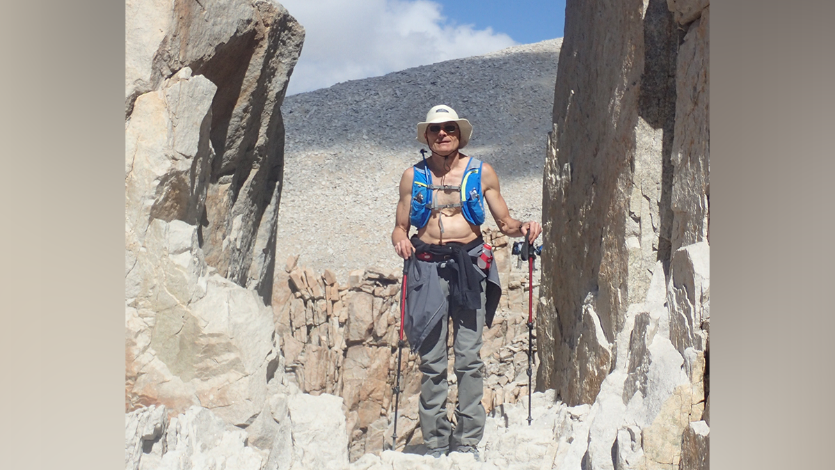Dr. Dennis Smith pictured on a hike in 2016.