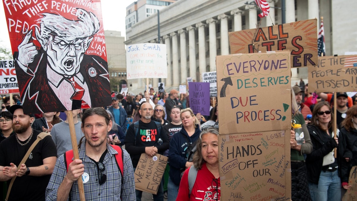 The demonstrators protested during a demonstration on May against US President Donald Trump and immigration policies in Denver, Colorado on May 1, 2025.