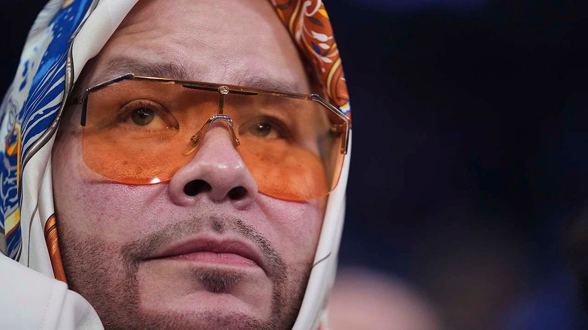 Fat Joe watching the Knicks basketball game.