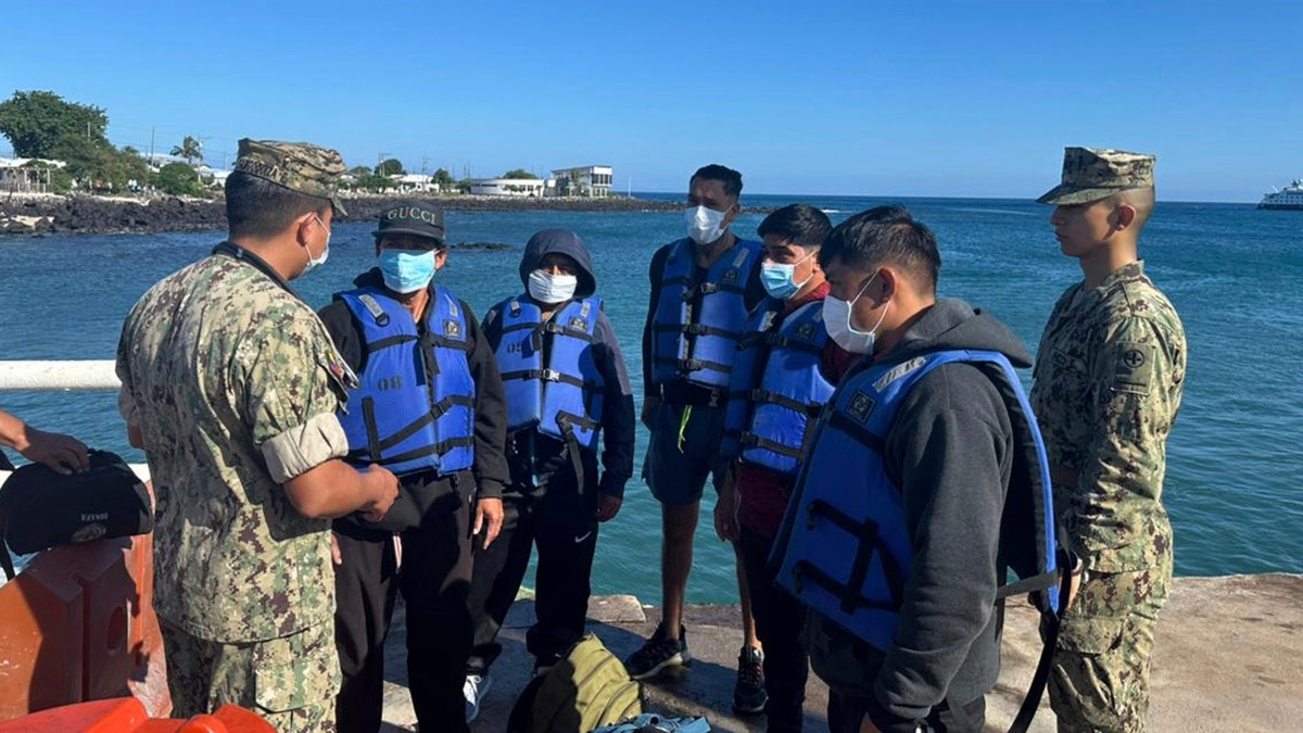 fishermen wearing lifejackets