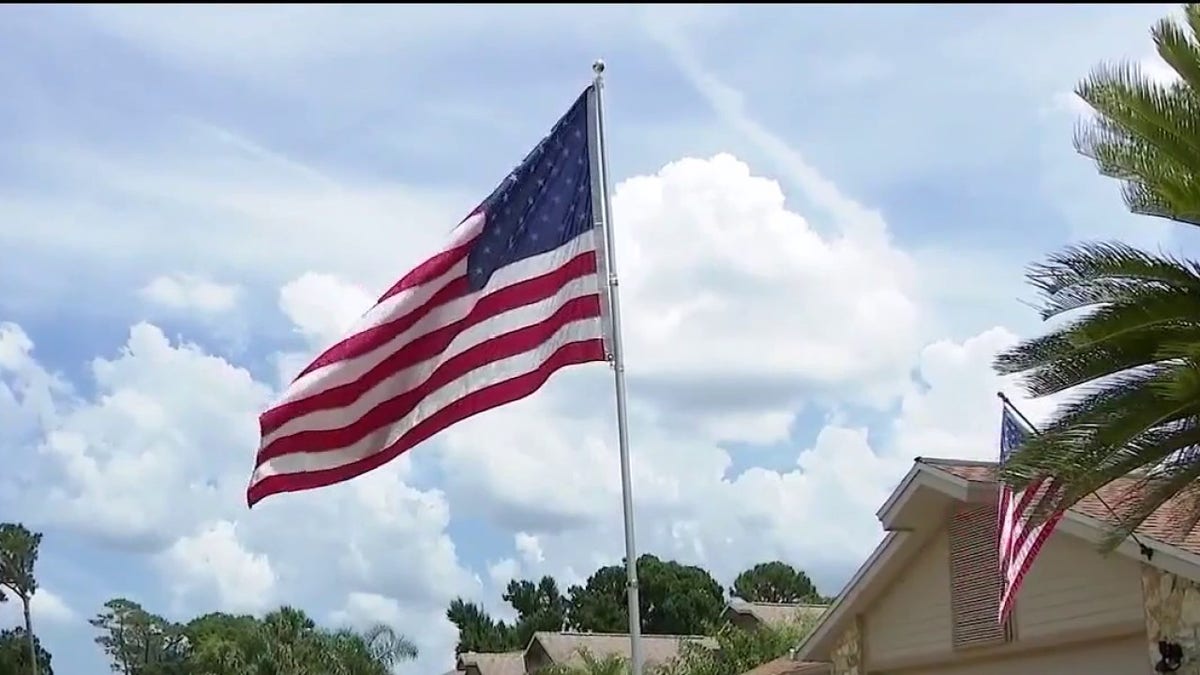 American flag flying in veteran's yard