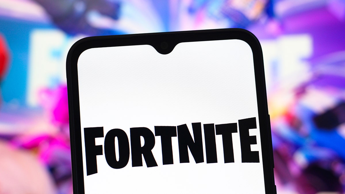 Fortnite logo on a phone screen.