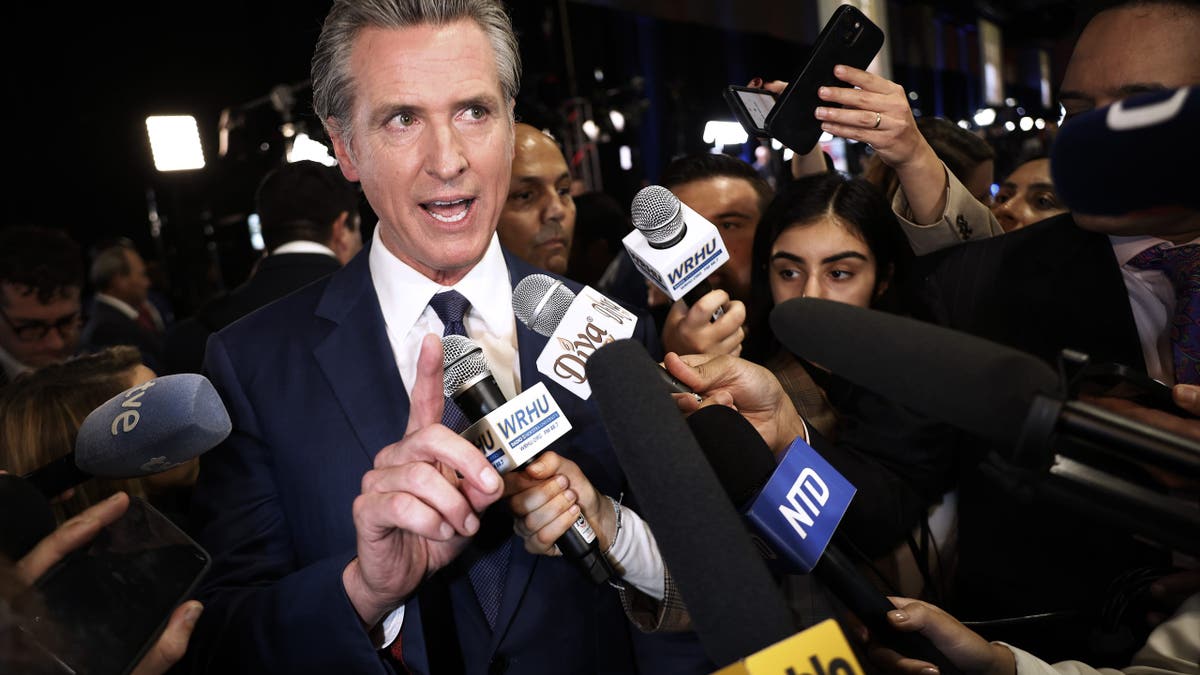 Newsom talking to reporters