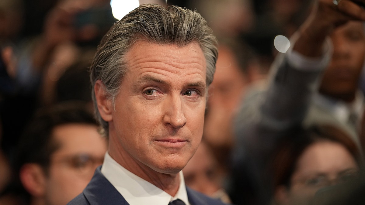 Gavin Newsom raises his eyebrows