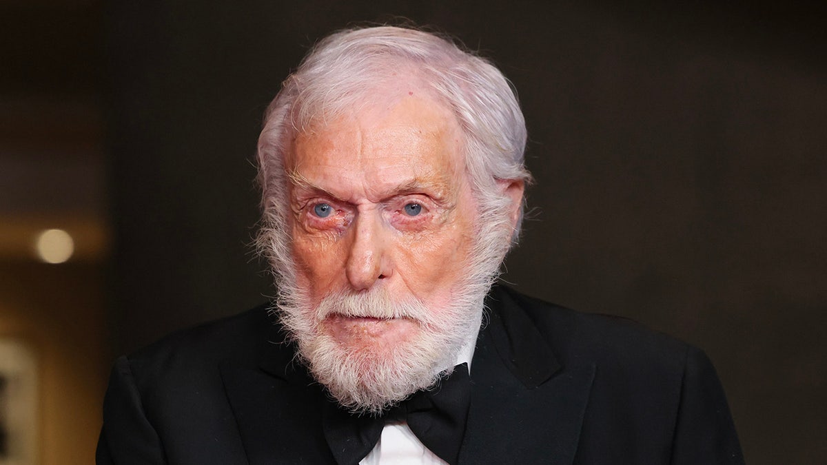 A close-up of Dick Van Dyke in a suit and bow tie.