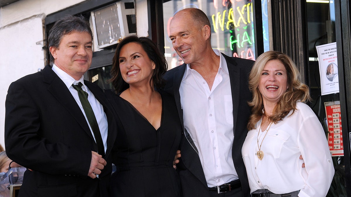 Mariska Hargitay being embraced by her siblings at the Hollywood Walk of Fame.