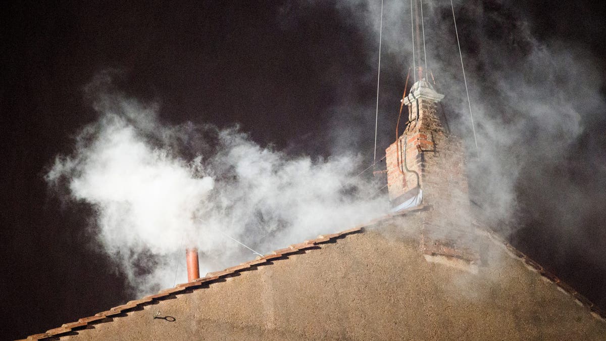 White fume rises from nan chimney of nan Sistine Chapel successful nan Vatican, 13 March 2013. White fume indicated that a caller Pope has been elected.