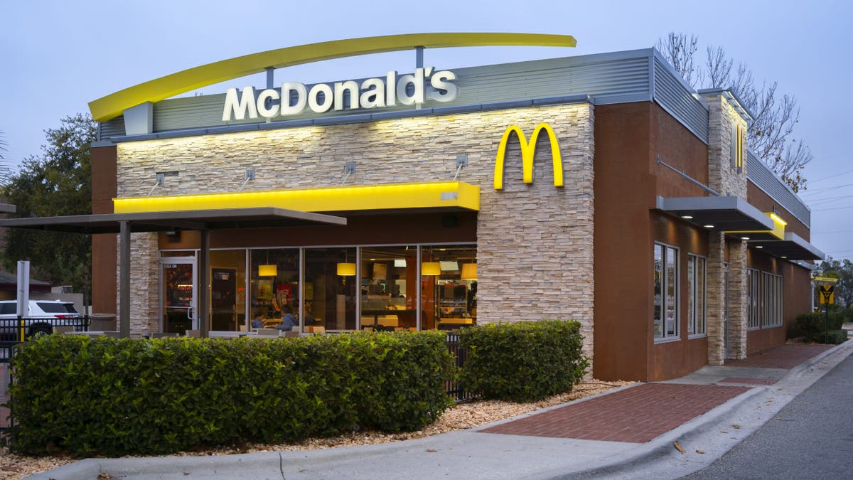 Exteriors of the front of a suburban McDonald's. The company is selling a Cotton Candy Sprite trending on social media