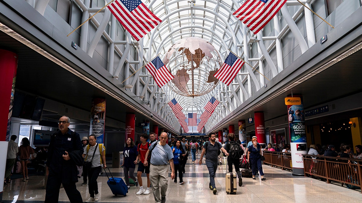 Travelers at O'Hare International Airport