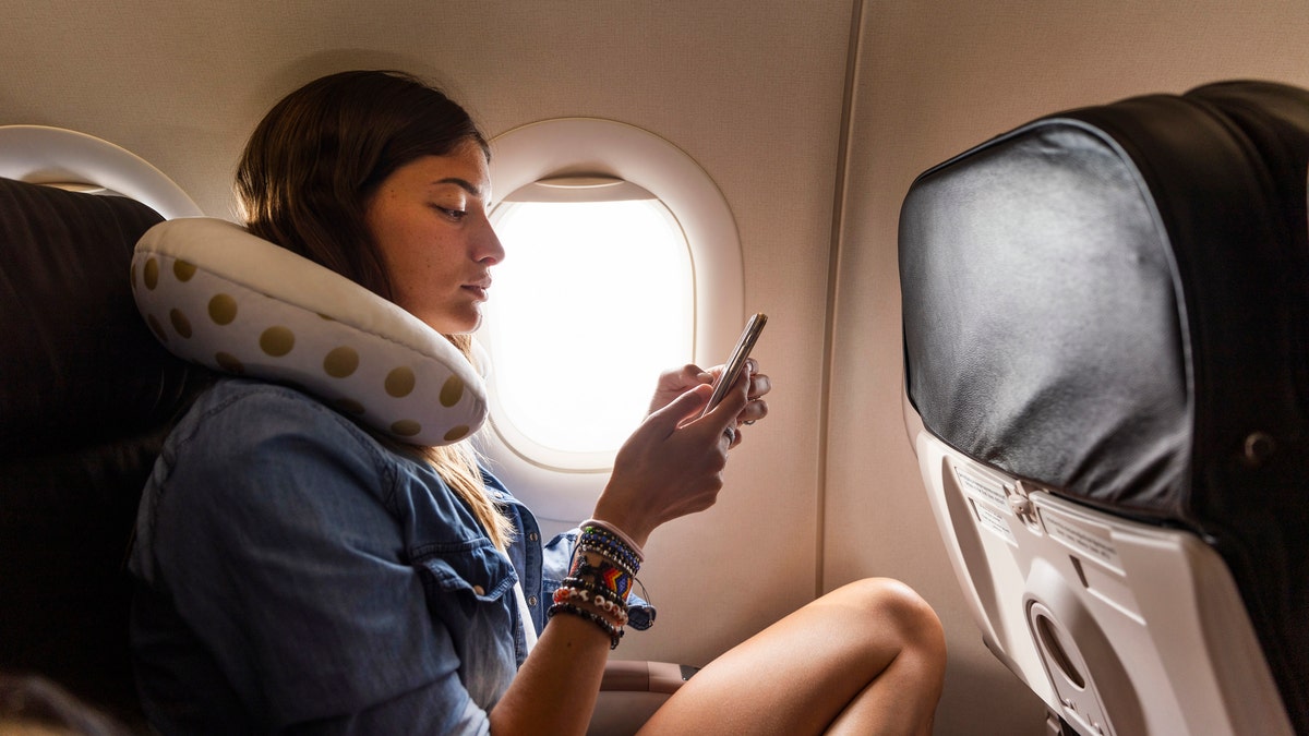 Summer travelers are using a pillowcase trick to bring extra items on flights for free flight passenger with neck pillow