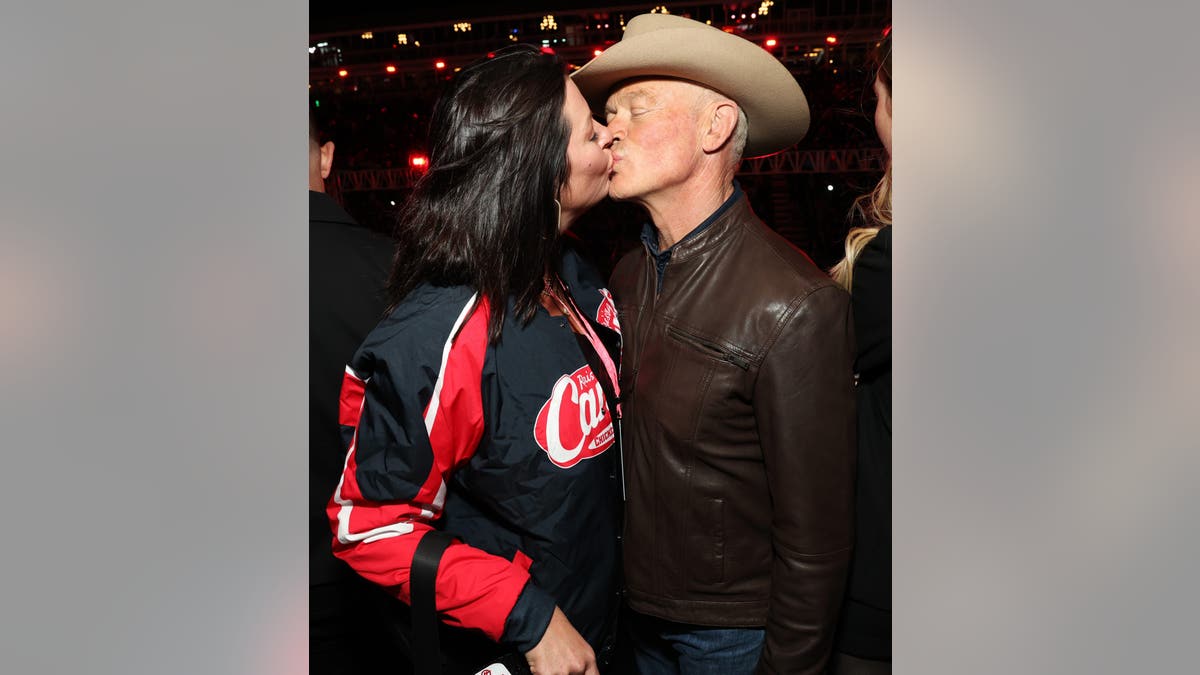 Neal and Ruve McDonough kissing