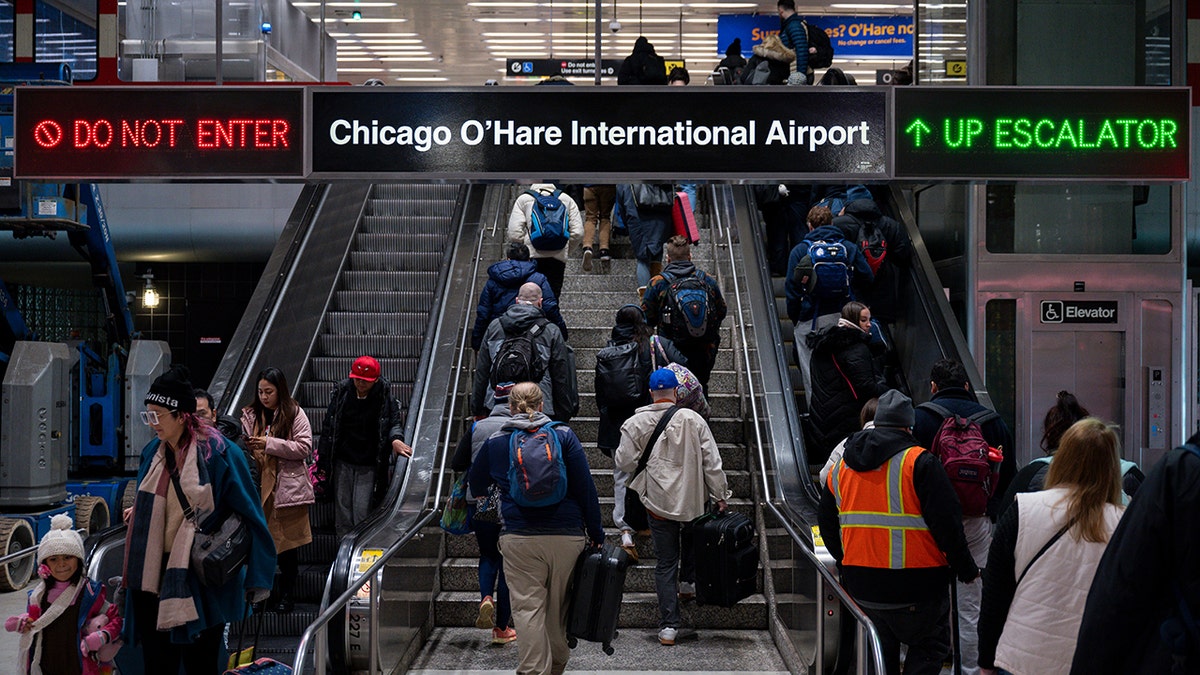 Travelers at O'Hare International Airport