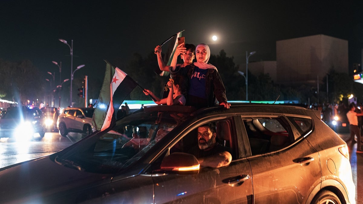 Syrian people celebrate