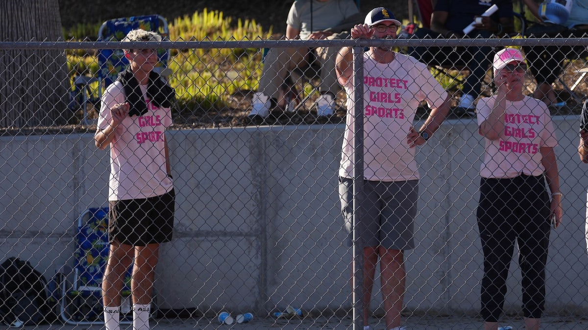 Spectators wear Protect Girls Sports shirts during the CIF Southern Section Division 3 Track and Field preliminaries at Nathan Shapell Memorial Stadium at Yorba Linda High School on May 10, 2025, in California.