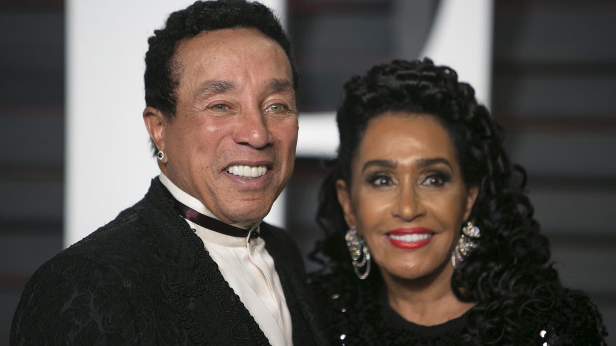 smokey robinson and wife frances on red carpet