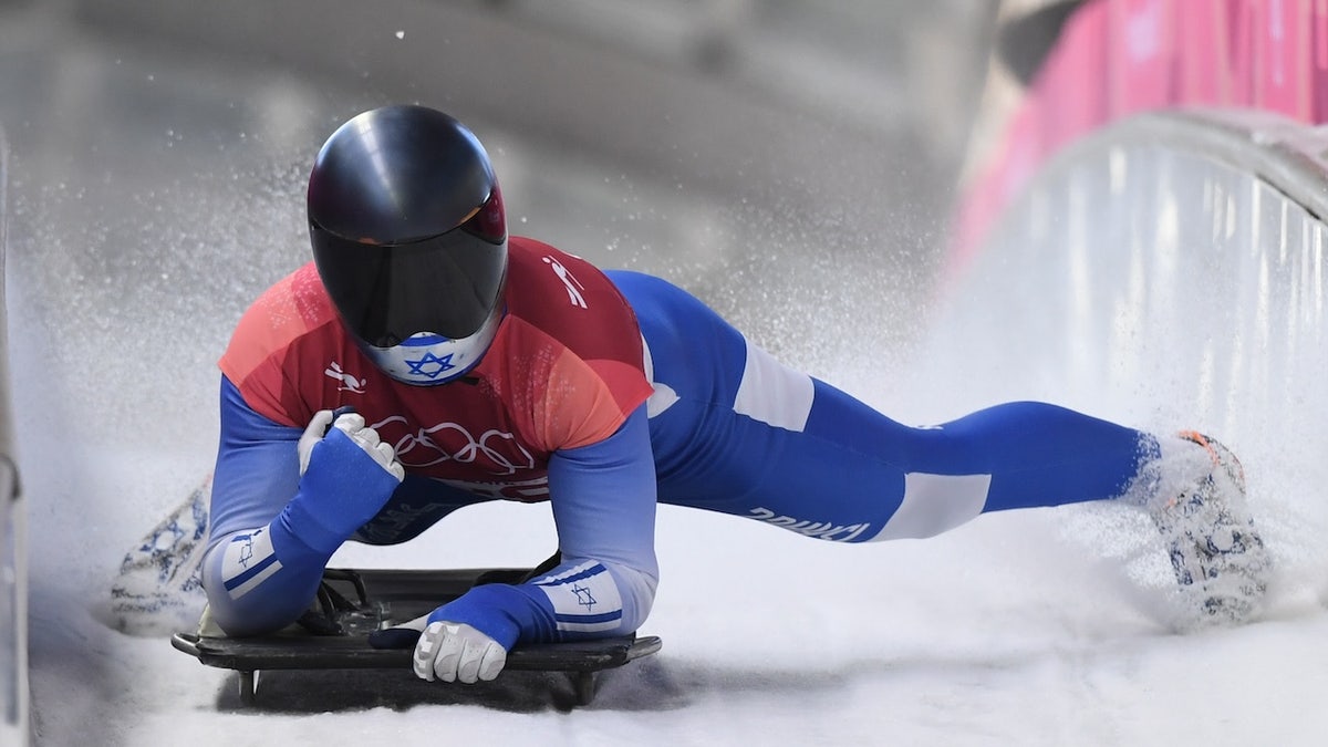 Israel's Adam Edelman slows down at the end of the men's skeleton heat 2 during the Pyeongchang 2018 Winter Olympic Games, at the Olympic Sliding Centre on Feb. 15, 2018 in Pyeongchang, South Korea.