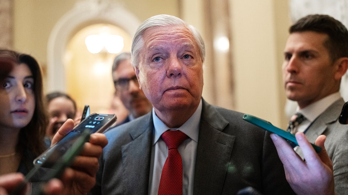 Reporters surround Graham at the Capitol