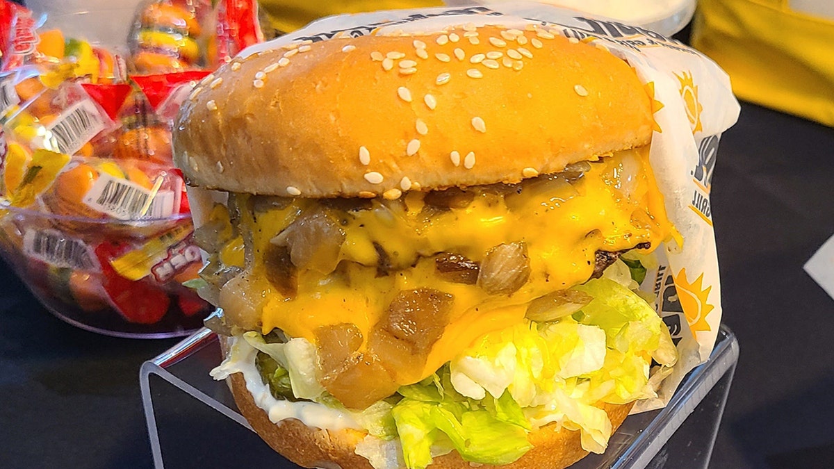 A Habit Burger & Grill burger is shown.