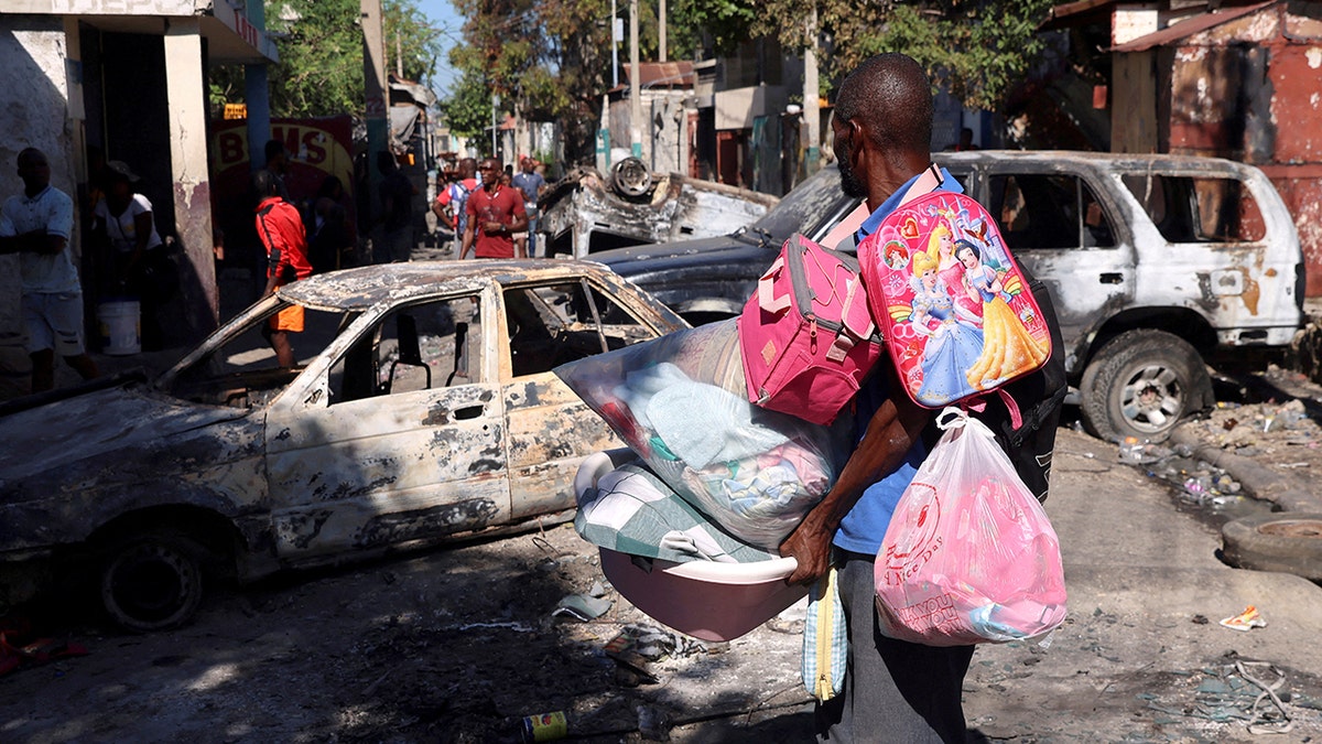 Haitians flee their homes for gang violence, in Port-au-Prince