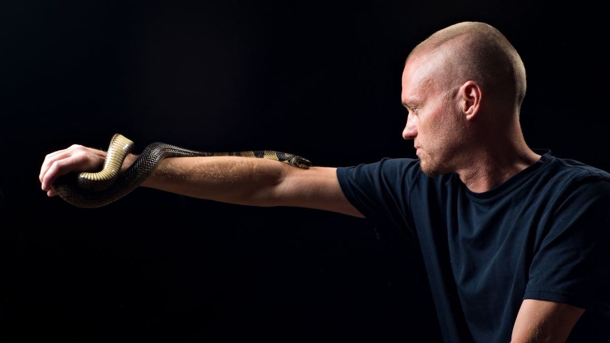 Tim Friede with snake