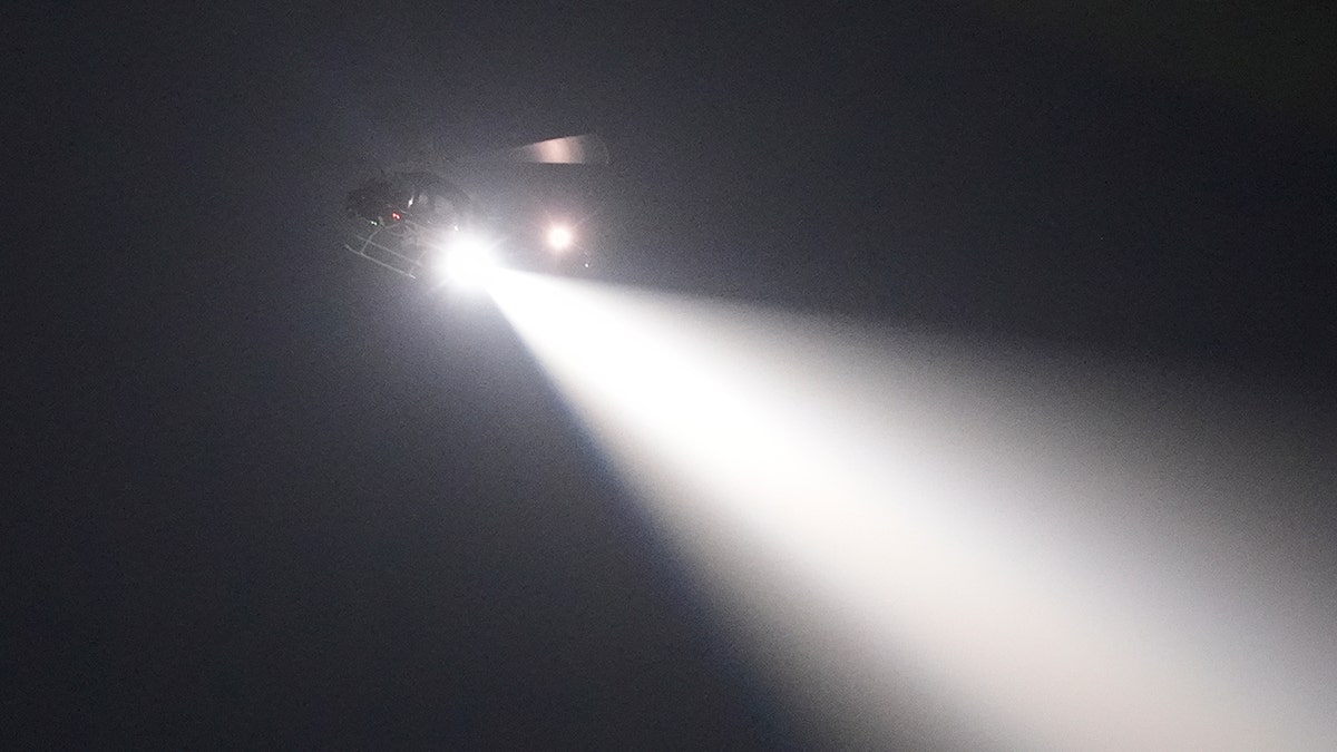 Police helicopter chases fugitive escaped from New Orleans jail, May 20, 2025.