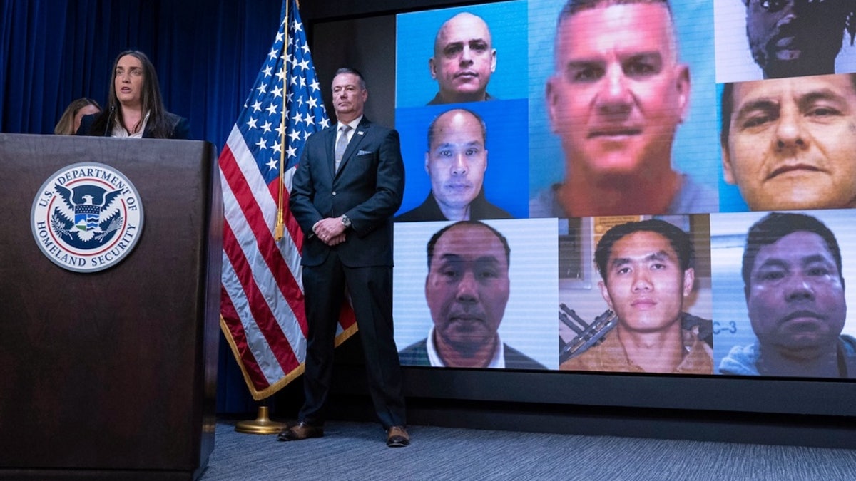 Deputy ICE Director Madison Sheahan, flanked by ICE Acting Director Todd Lyons, speaks during a news conference at ICE headquarters on May 21, 2025, in Washington, D.C. (AP Photos/Jose Luis Magana) 