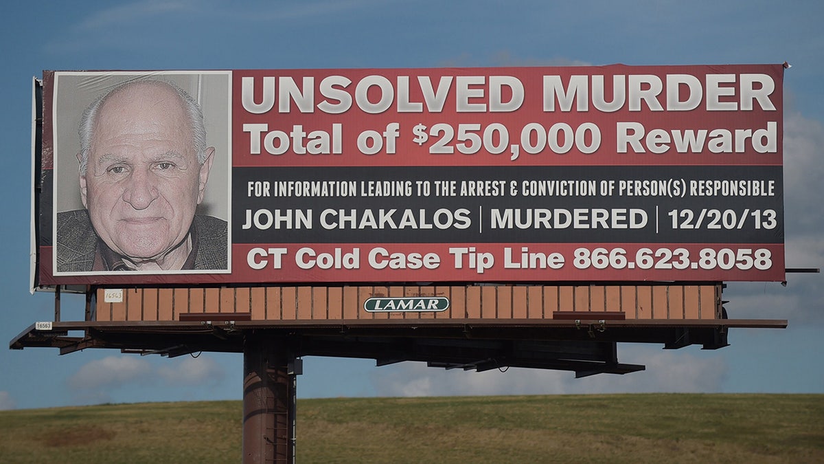 A billboard for John Chakalos' murder.