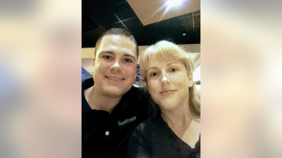 Cheryl Holsenbake posing with her son Micah.
