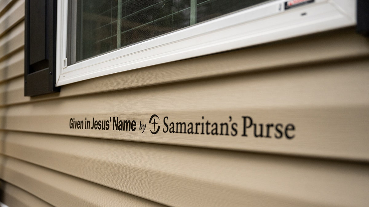 Sign on mobile home reads